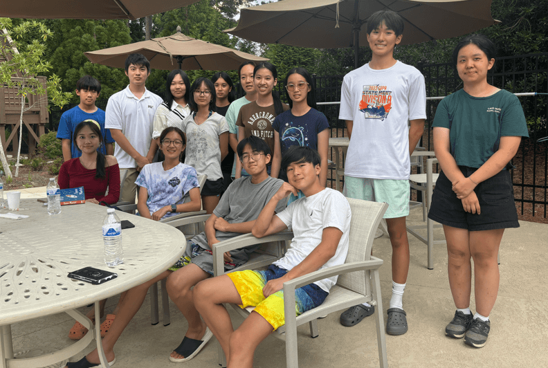 First Step student leaders gathered after an outdoor meeting