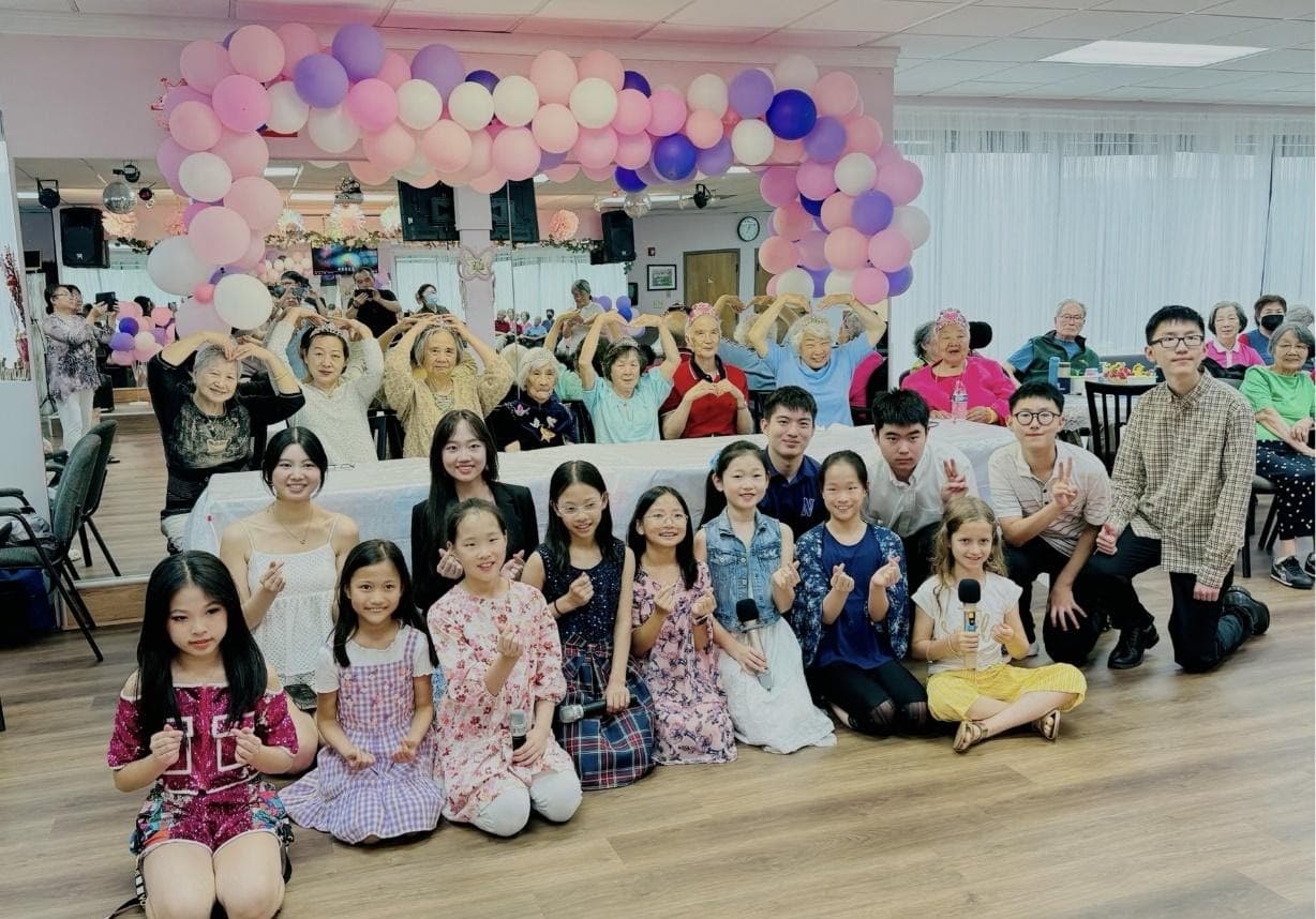 First Step performers posing with senior center residents