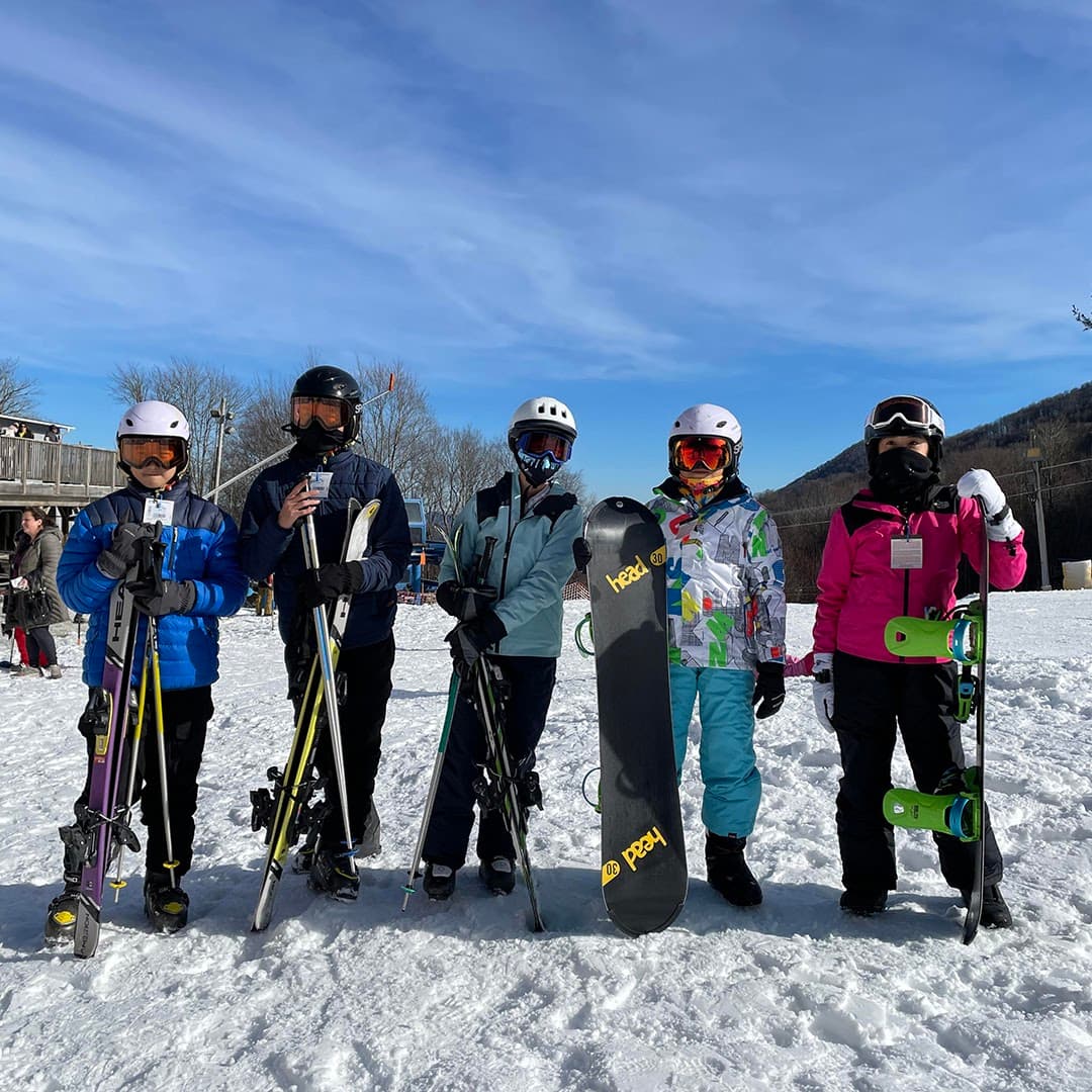 First Step members together in ski and snowboard gear